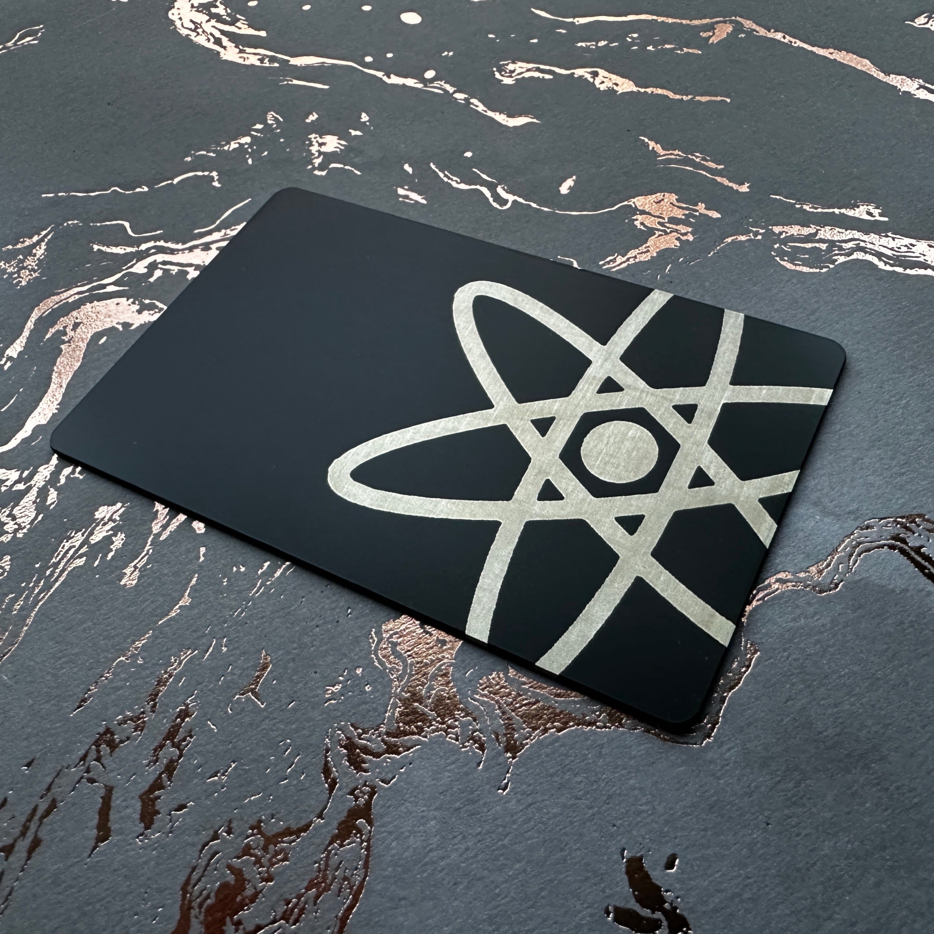Custom Black steel tap business card, engraves silver on black. tap to share contact information and digital business card
