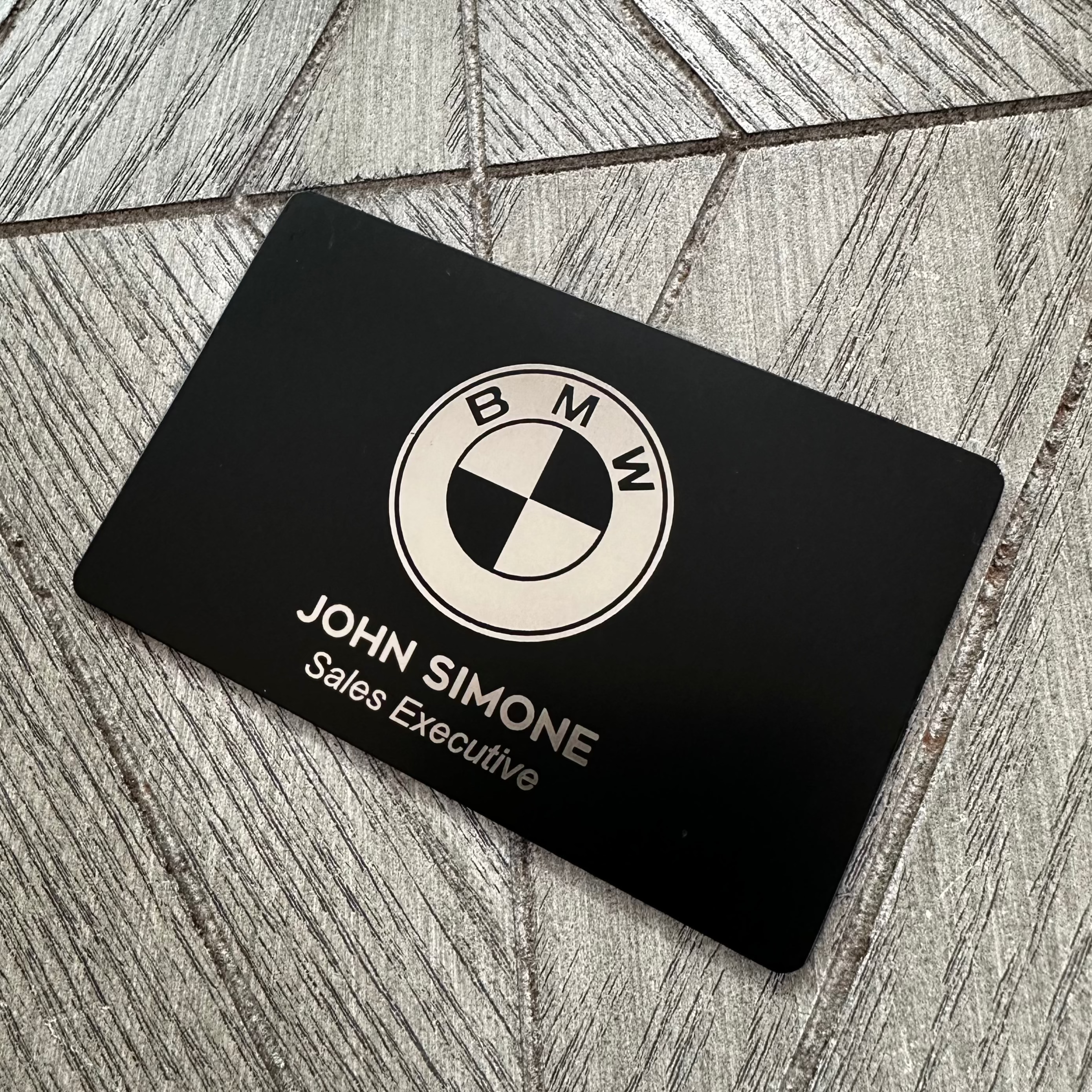 custom engraved matte black metal business card. tap to share contact info and digital profile