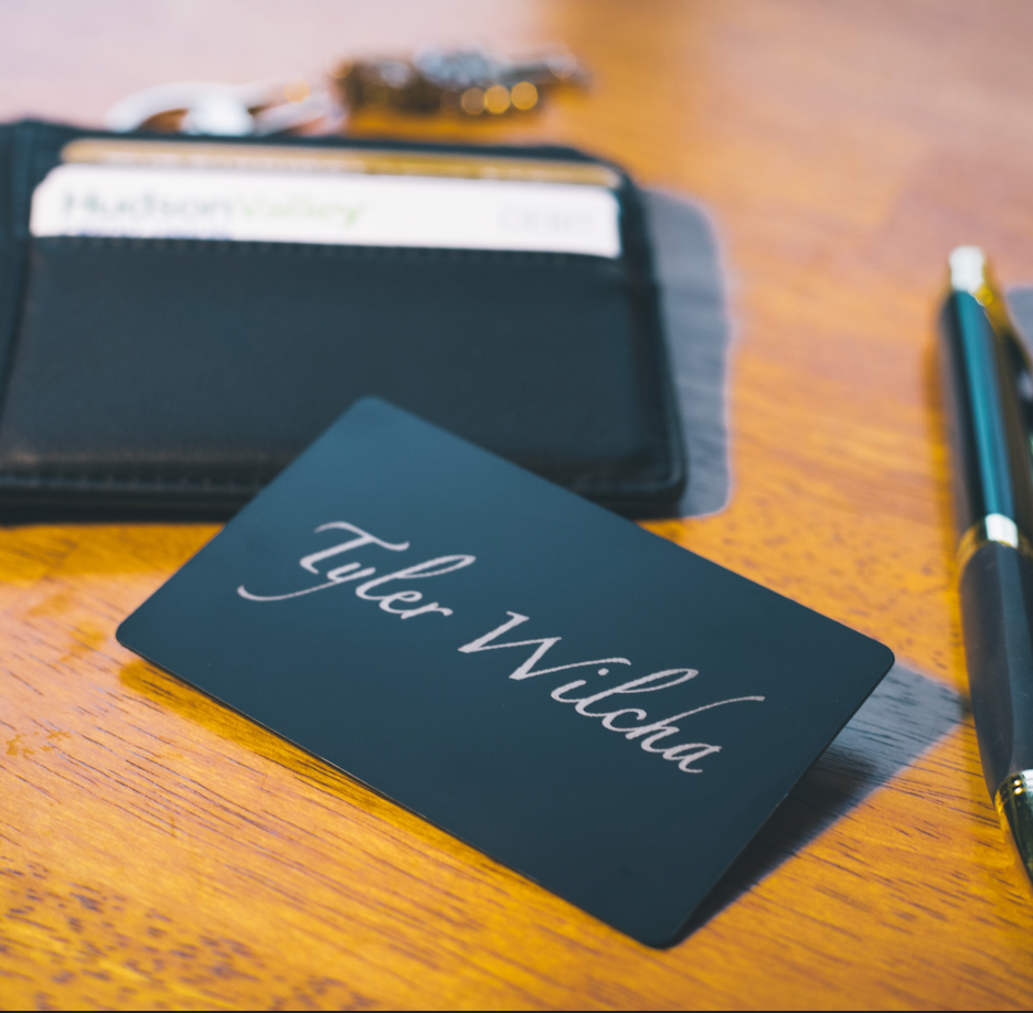 Custom Black steel tap business card, engraves silver on black. tap to share contact information and digital business card