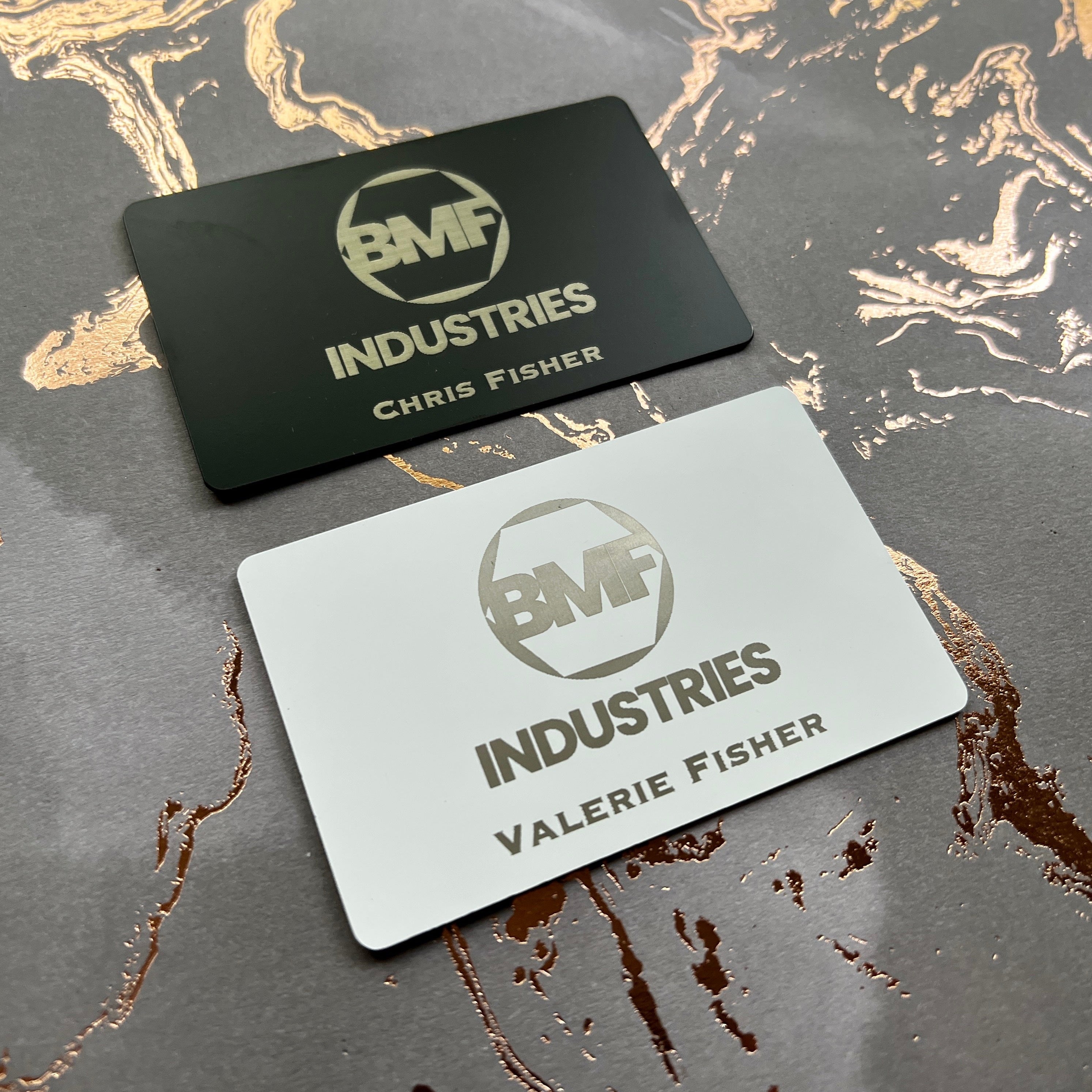 Custom White Tap Metal Business Card. Engraved silver on white. Tap to share contact information and digital profile