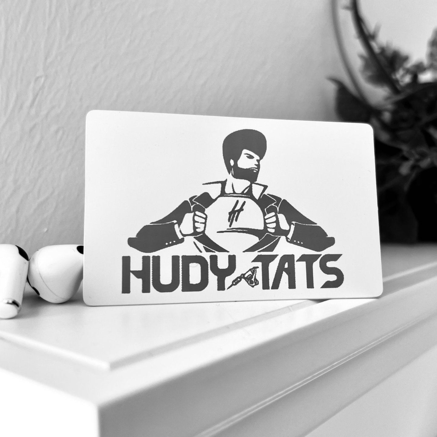 Custom White Tap Metal Business Card. Engraved silver on white. Tap to share contact information and digital profile