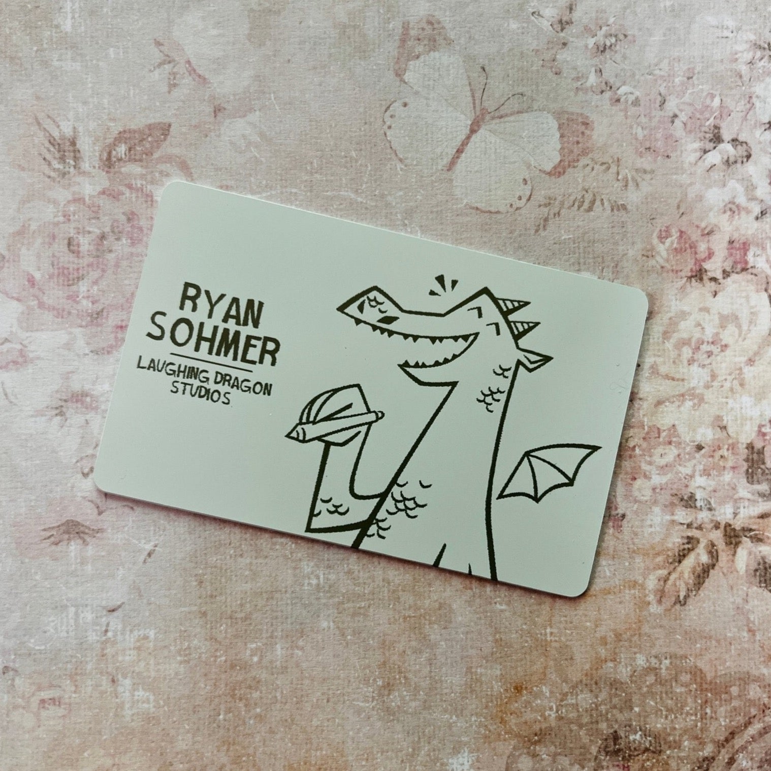 Custom White Tap Metal Business Card. Engraved silver on white. Tap to share contact information and digital profile