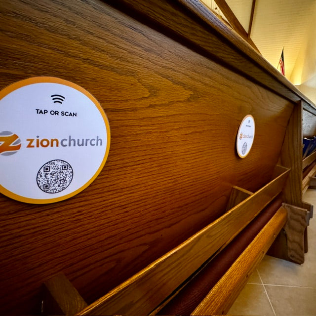 tap to scan qr sign on church pew