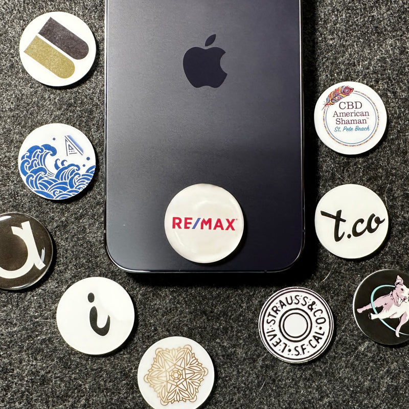 custom sticky dot nfc tap tag, tap tag sticks to back of bottom of phone. Tap to share contract info and digital profile 